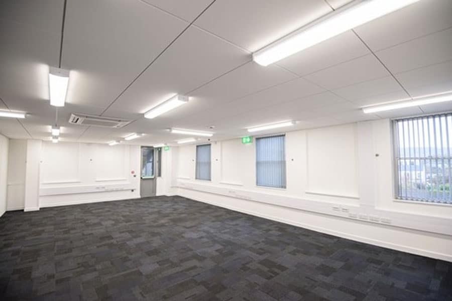 An example of commercial office strip lighting installed by REF
