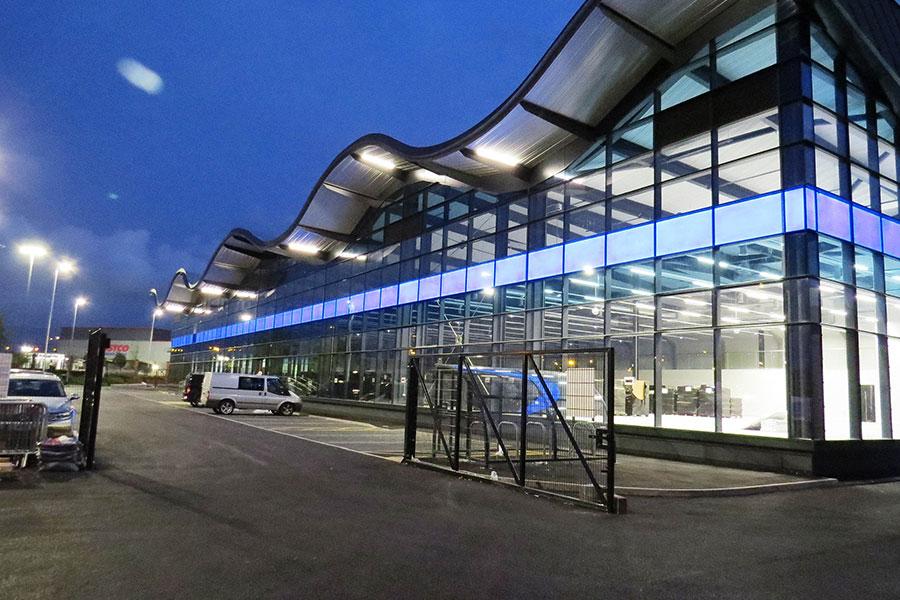 Nisbets Warehouse, a glass waved roofed building.