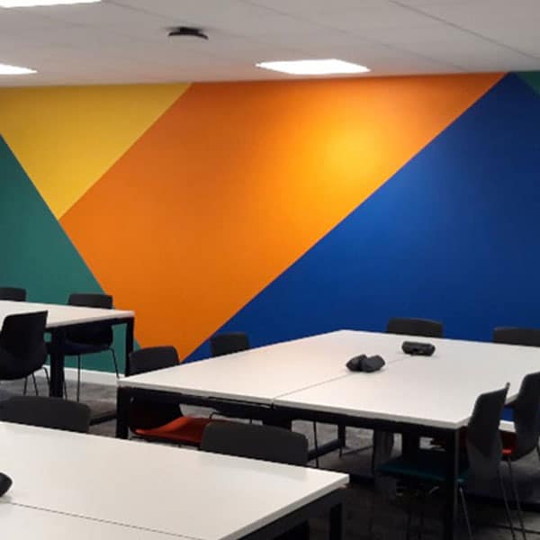 One of Yeovil College's classrooms with a abstract colourful wall
